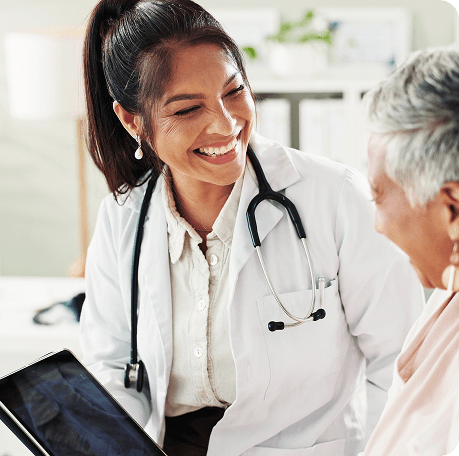 Russell Medical staff member assisting a patient